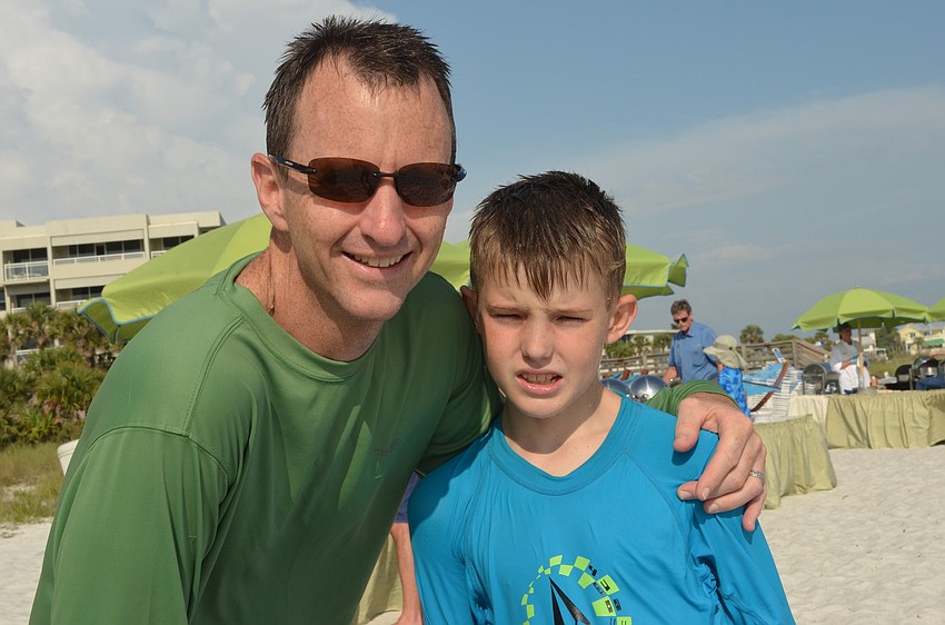 Don Paxton and his son Grady grabbed some barbeque after enjoying the water.