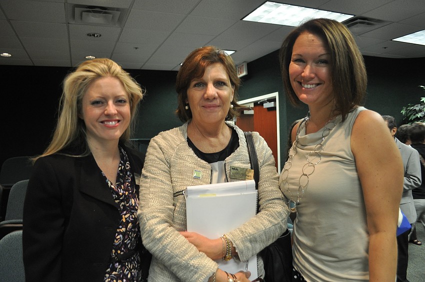 Liz Reuth, Karen Byrnes and Tashara Cronshaw of Neal Communities