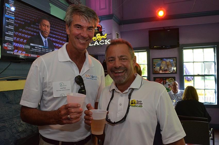 Joel Pye of Sun Coast Home Concierge and Glen Cappetta of Sun Ride Pedicab