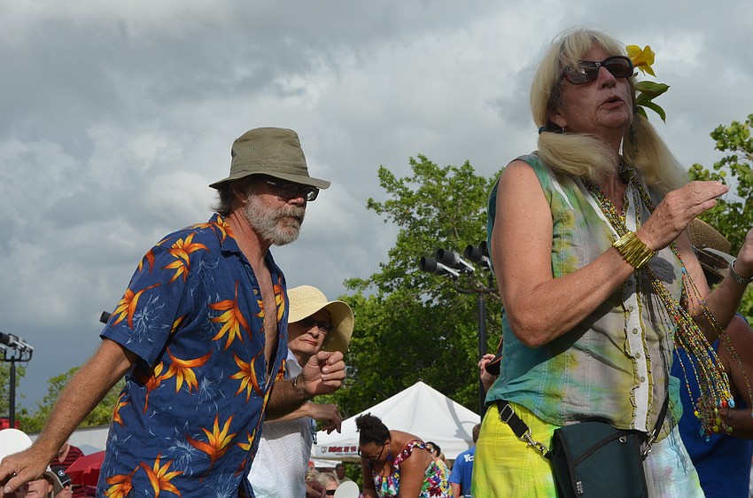 Bill Bronson and Jodi John dance to the Beatles.