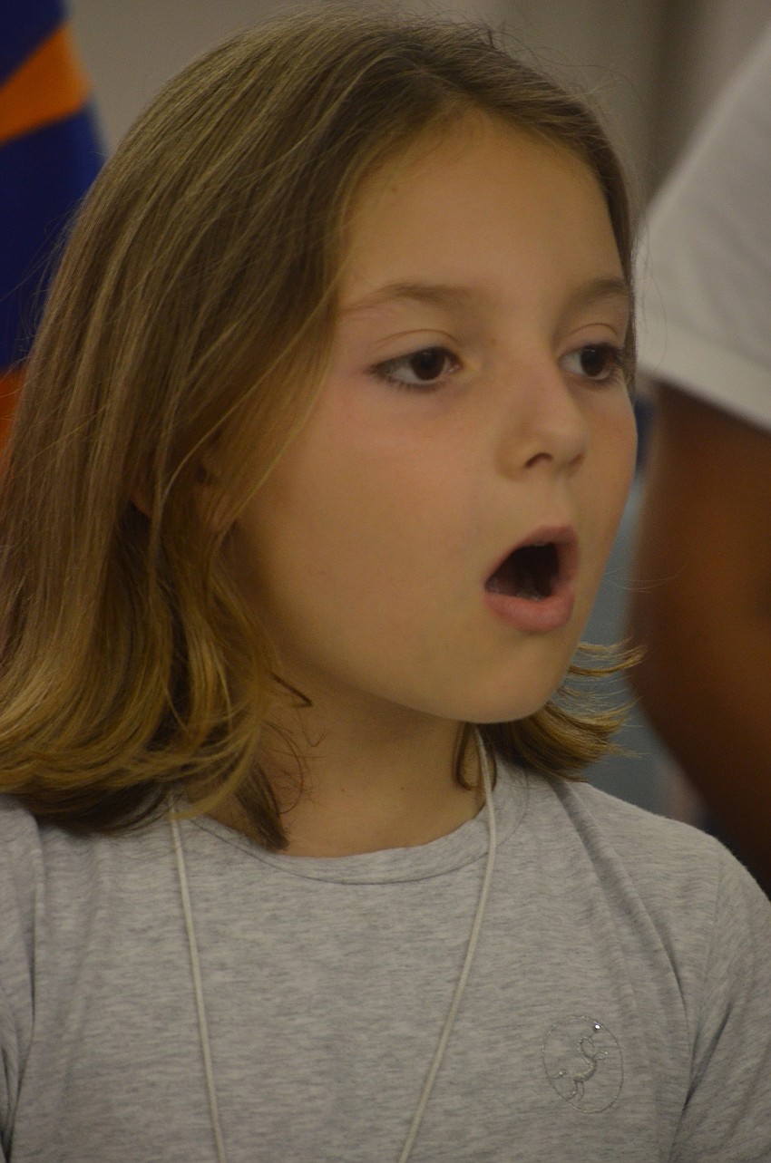 Alice Lotti sings after listening to Maestro Jesse Martinâ€™s instructions.