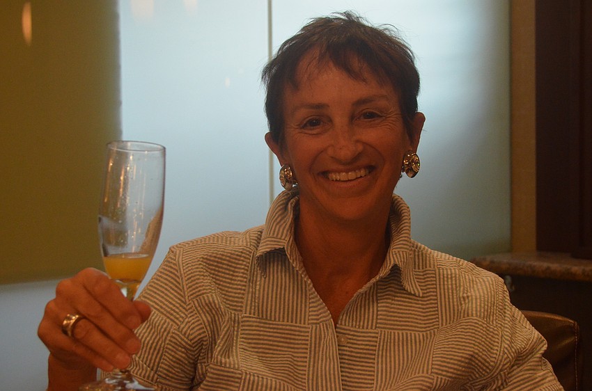 Martha Schantz enjoys the spa day with a mimosa. Schantz moved to downtown Sarasota in 2009 from Virginia.
