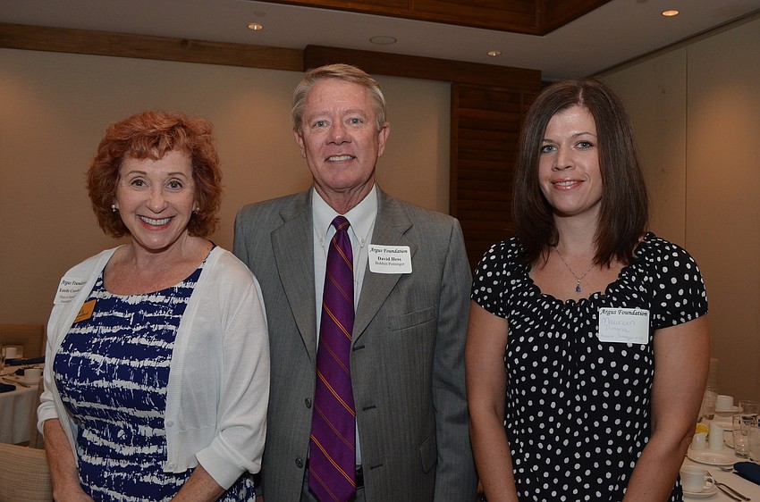 Estelle Crawford, of Pines of Sarasota Foundation, David Hess and Maureen Pingree, of Bobbitt Pittenger