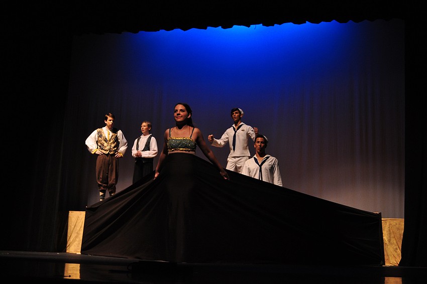 Taylor Trent serves as the ship's masthead.