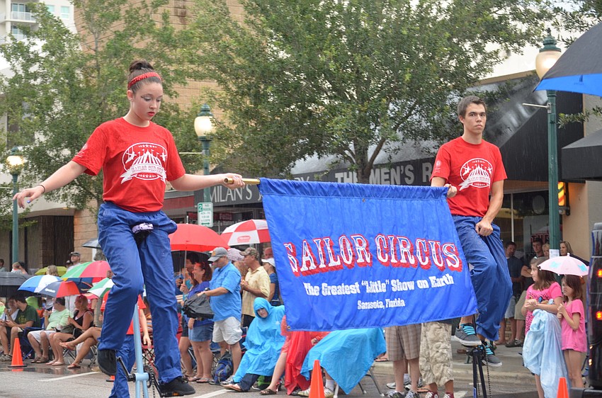 The Sailor Circus rided their unicycles right behind Nik Wallenda in the parade.