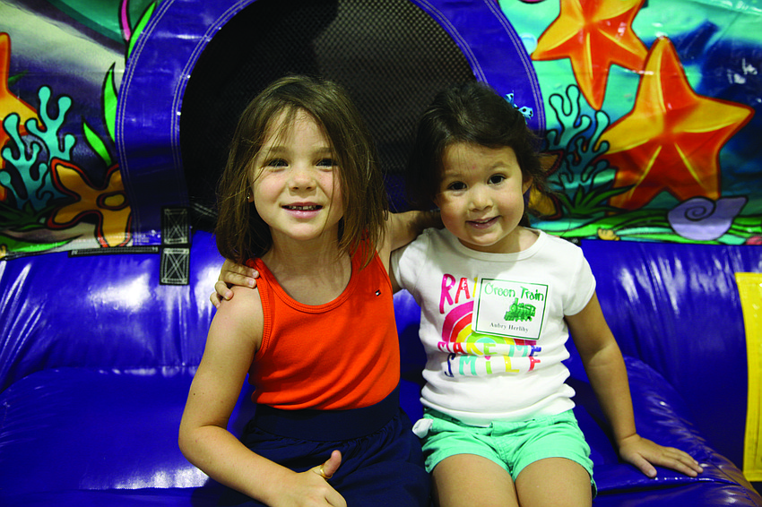 Macy Kermode and Aubry Herlihy enjoy â€œThe Little Mermaidâ€ bouncer.
