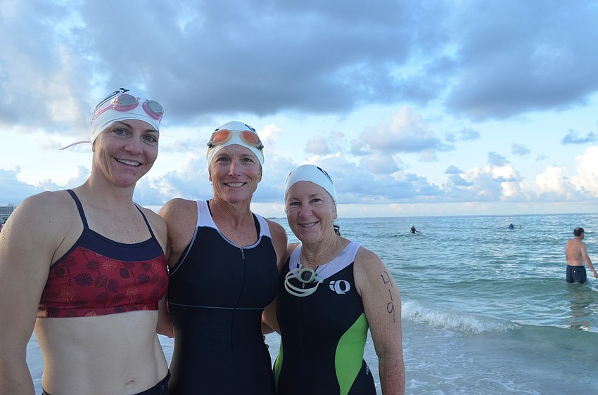 First time triathlete Karen Harbaugh gets tips from Debbie Ozner and Gail Lynch who have been training and completing triathlons together for more than 20 years.