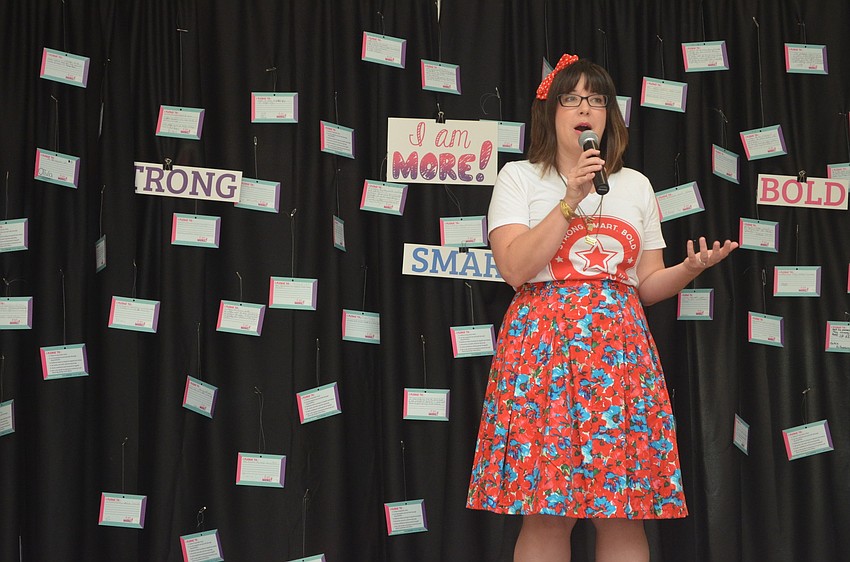 Lindsey Nickel calls Girls Inc. singers to the runway to sing â€œI am More,â€ â€” a song Nickel wrote for the girls. The song is available on iTunes and proceeds from the purchase will go to Girls Inc.