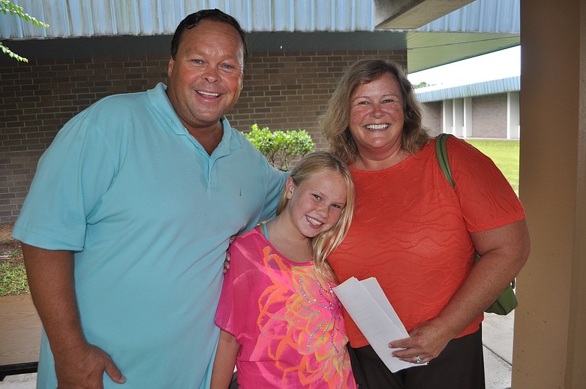 Bob and Helen Thurber with their fourth grade daughter, Olivia, who will join the chorous at Tara Elementary after transferring from Rowlett Elementary.