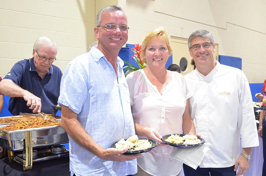 Mike and Lucy Beaumire with Paul Mattison
