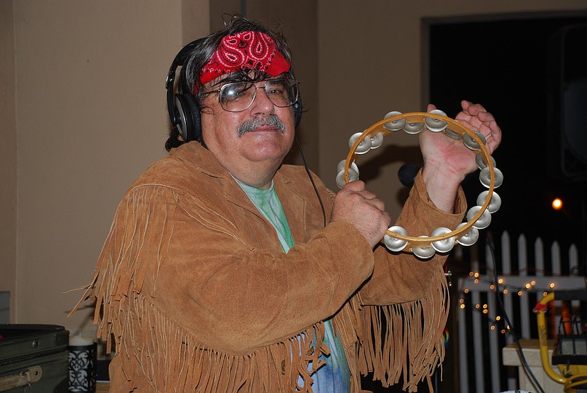 Greyhawk resident Rich Biribauer dressed up while he manned the music.