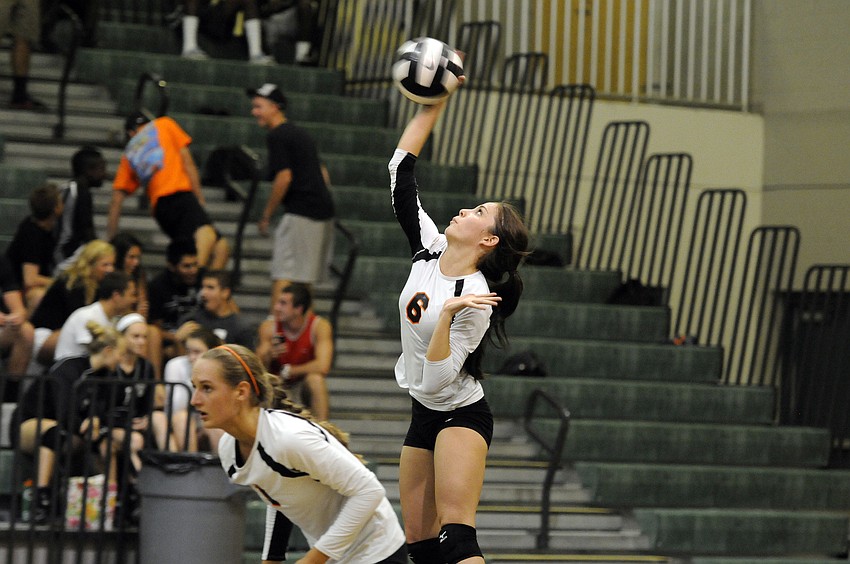 Sarasota junior Jordan Brooks serves the ball in Game 2.