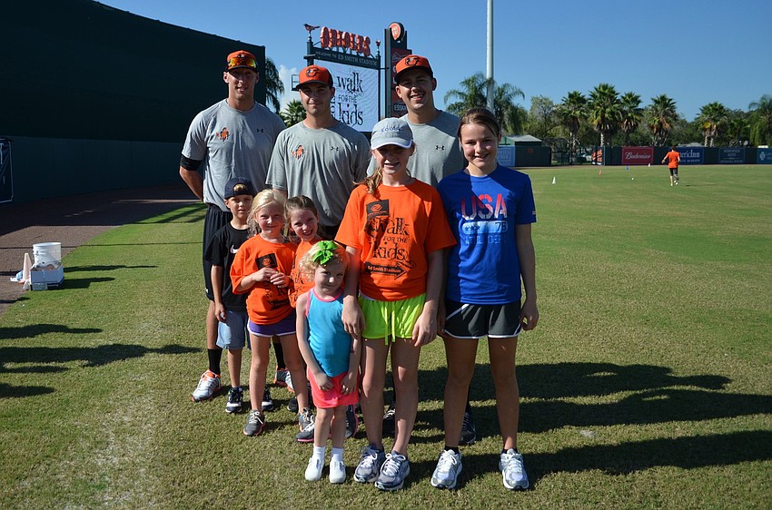 Players Derrick Bleacker, Lex Rutledge and Daniel Ayers with Ryan Gustafson, Aubrey Wiese, Hope Hrovat, Karlie Gregory, Mikaila Norcott and Nova Biekon