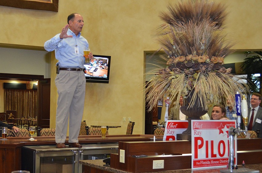 John Saputo welcomes everyone to the reception.