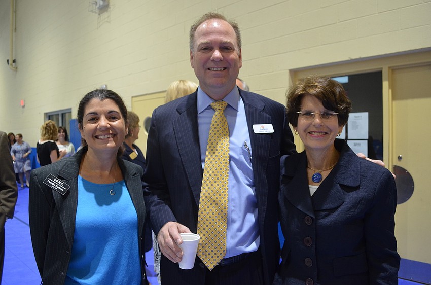 Lourdes Ramirez of CONA, Craig Tuley of Suntrust Bank and City Commissioner Susan Chapman