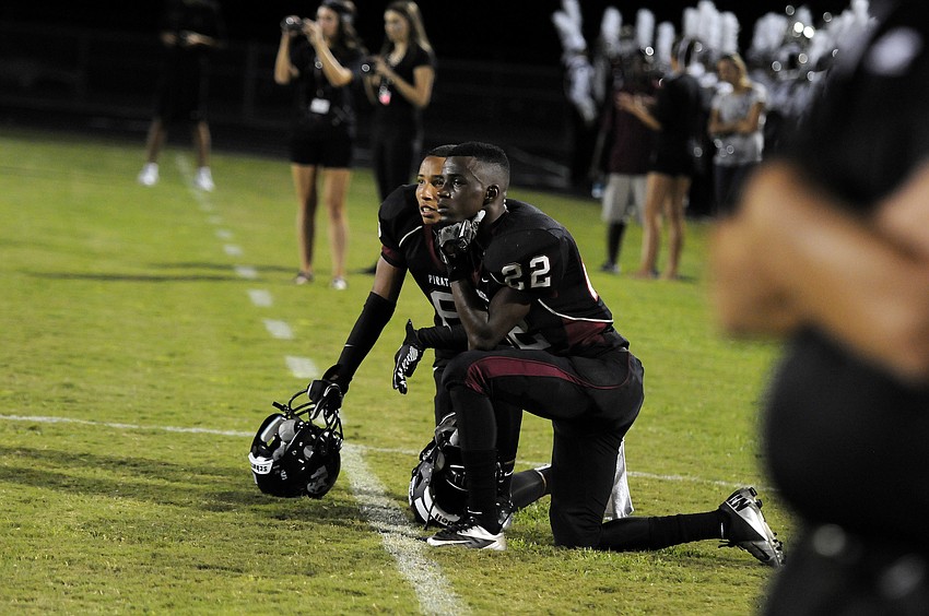 Braden River defensive backs Devyn Williams and Kedarius Smith look on as the Pirates attempt to make a comeback in the first half.