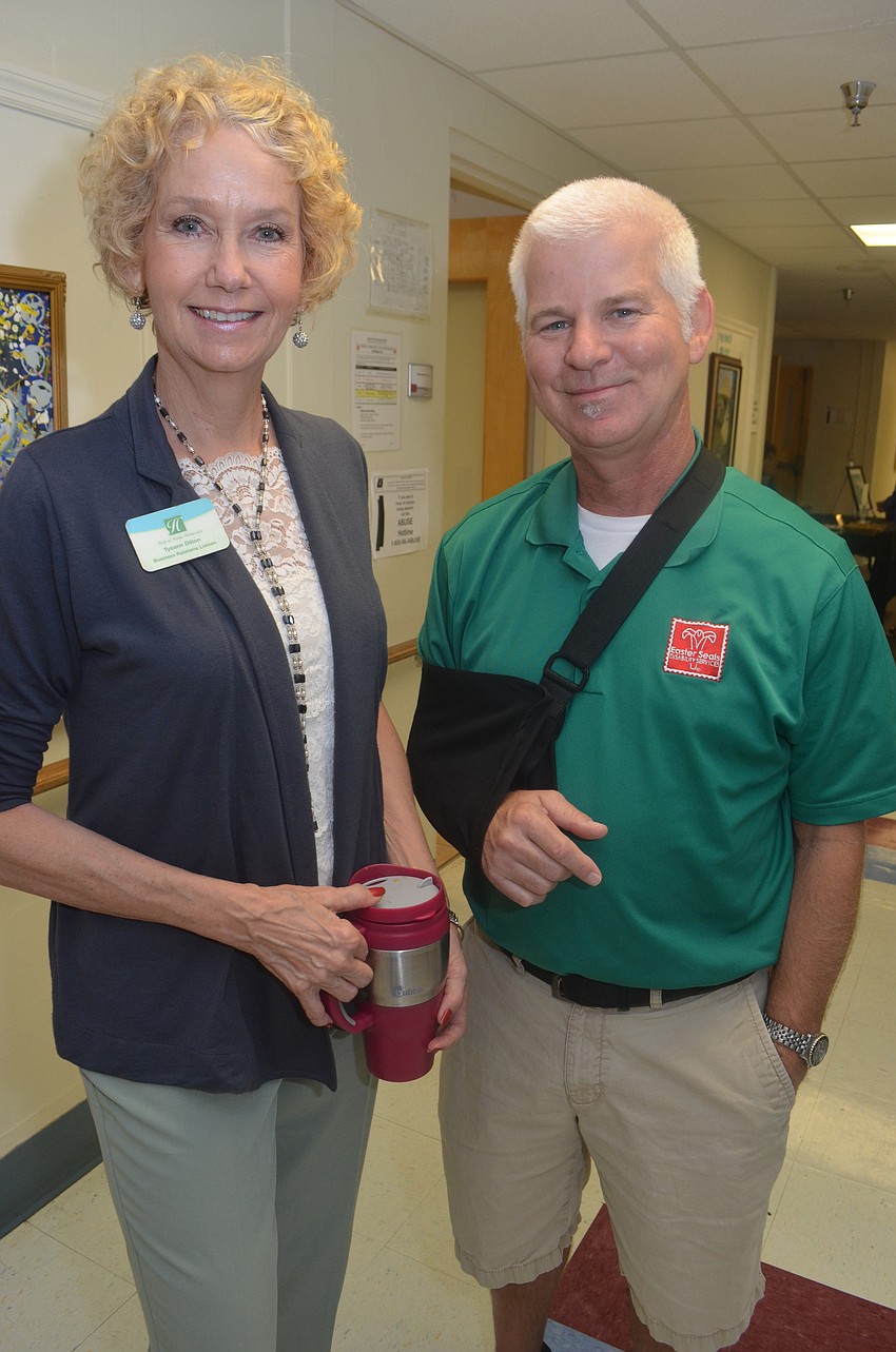 Tyeann Dillon of Help at Home Homecare and Don Herndon of Easter Seals