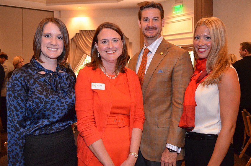 Jen Rust and Stacey Corley with Greg and Jennifer Steube