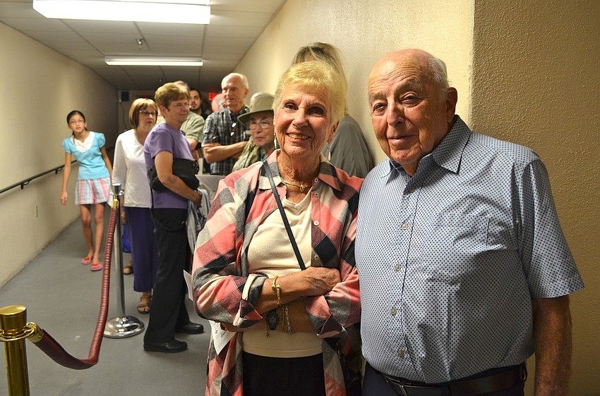 Joyce and Herb Furman wait in line for a backstage tour