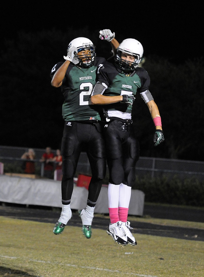 Cameron Pearcey and Trevor Losada celebrate following Pearceyâ€™s 11-yard touchdown catch in the third quarter.