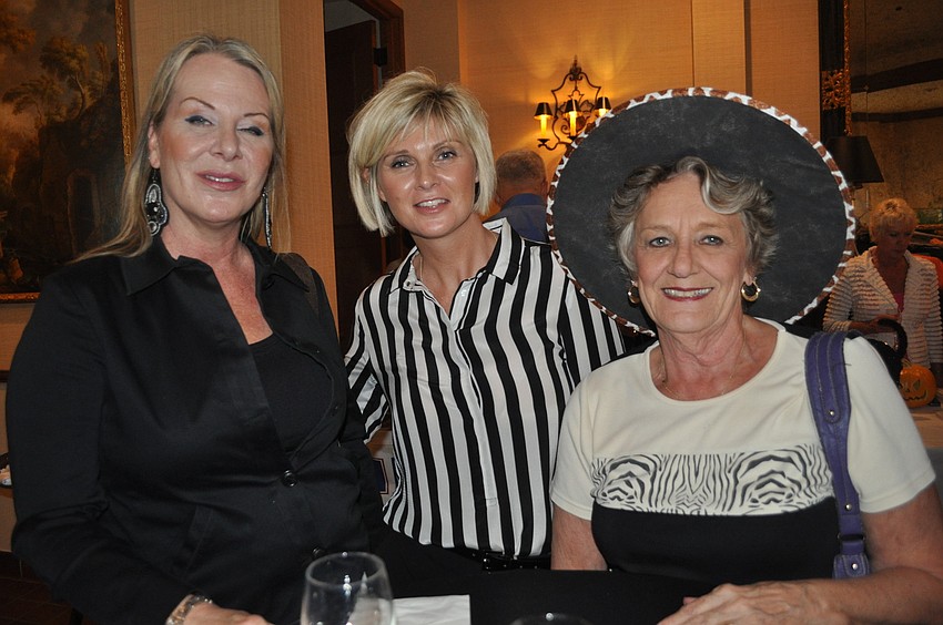 Victoria George and Helen Yanulevius of Masters of Real Estate and Lucy Pruitt of Coldwell Banker