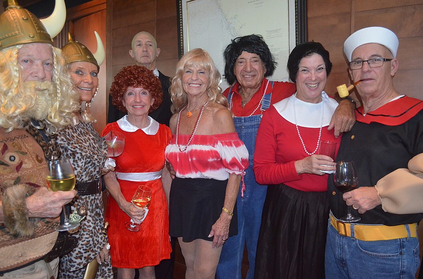 Jim and Bonnie Wilkes, Gwen and Tom Watson, Sue and Herb Berman and Barbara and Chuck Marzullo dressed as different comic strip characters