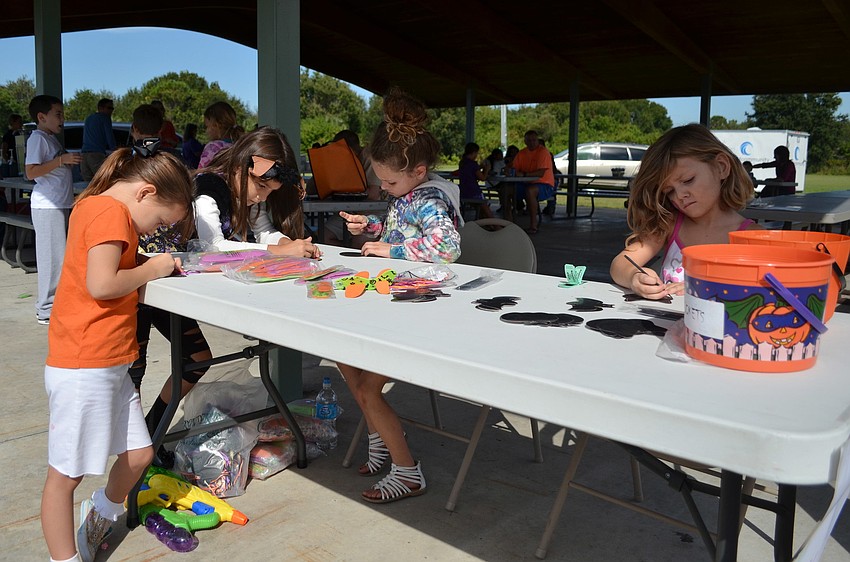Jamie Crum, Destiny Talbert, Paige Russell and Sadie Fletcher working hard at the craft table.