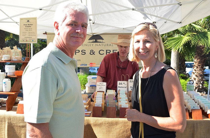 Franko and Wendy Totani shop at the Henley Natural Soaps and Creams tent at the Centre Shops Fall Festival.