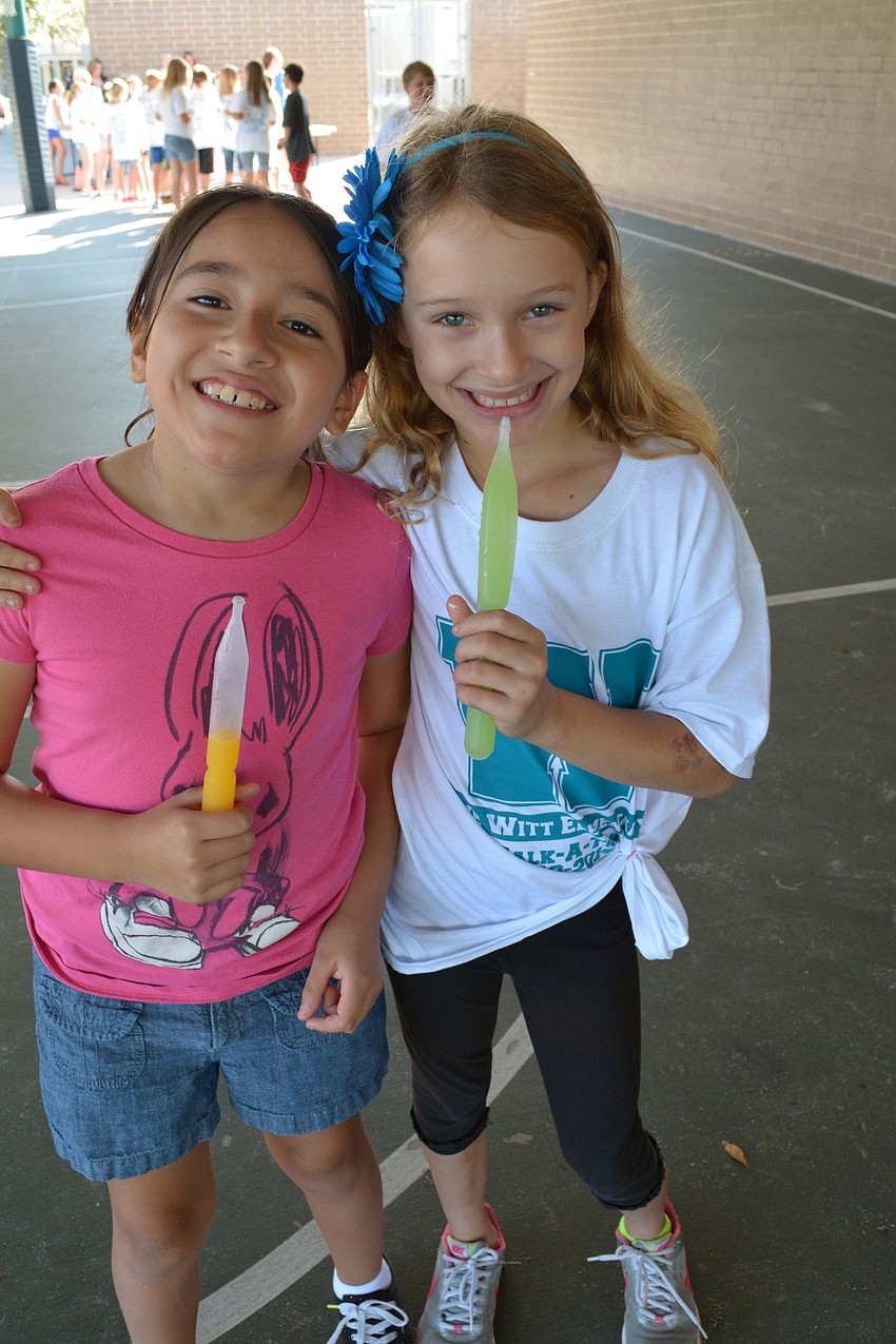 Cynthia Garcia and Kennedy Blair enjoyed popsicles.