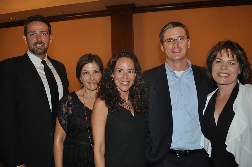 Christopher and Elaine Rigoli, Stephanie Consiglio and Larry and Kathy Price; Kathy Price is an assistant principal at McNeal.