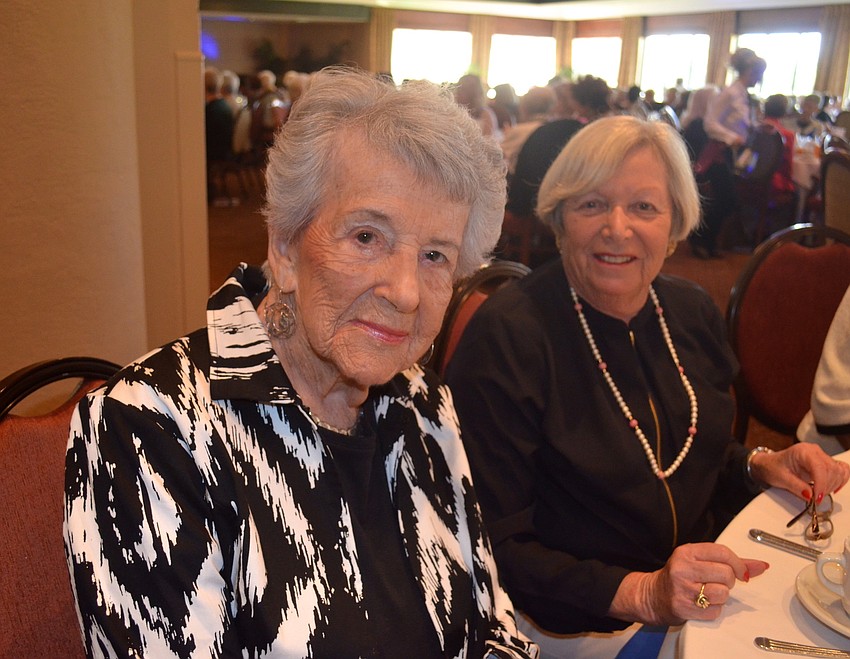 Marge Natell and Sandy Rotner prepare to eat lunch.