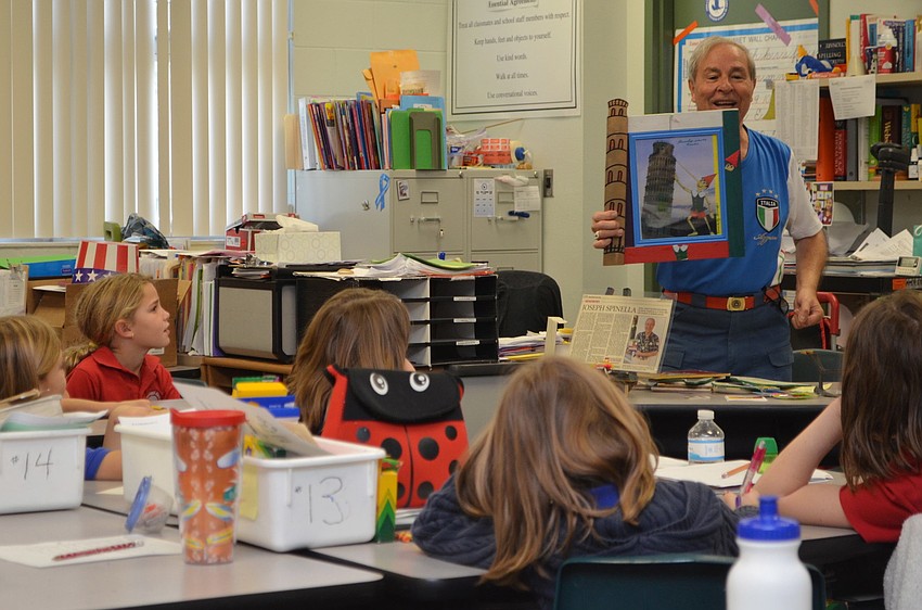 Author Joseph Spinella gives a brief history of Italy and his life before reading his book to the class.