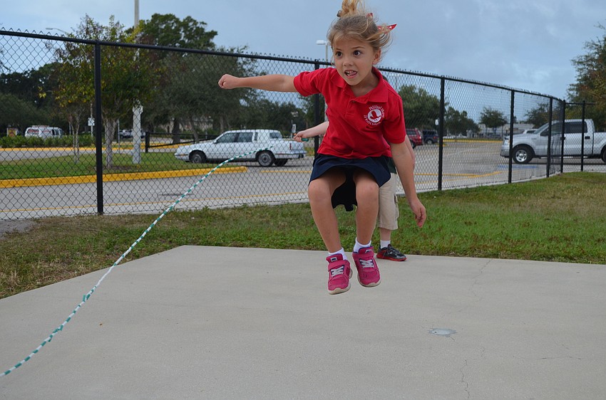 Anisha Dekamy jumps high