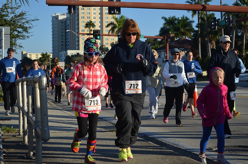 Runners pound the pavement for the Turkey Trot 5K.