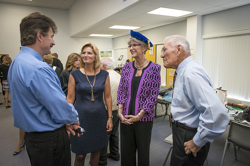 Dr. Michael Probstfeld (Dr. Carol F. Probstfeldâ€™s brother) and SCF President Dr. Carol F. Probstfeld, speak with Dr. Sarah H. Pappas, the collegeâ€™s fourth president, and Dr. Stephen Korcheck, the collegeâ€™s third president.
