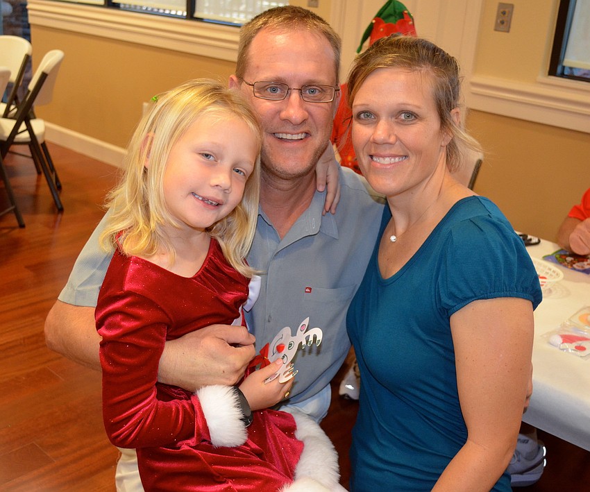 The Martin family â€” Sarah, 5, David and Jamie.