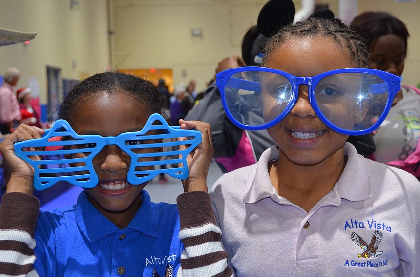 Kamiya Halloway and Mariah Murray dress up for the photobooth.