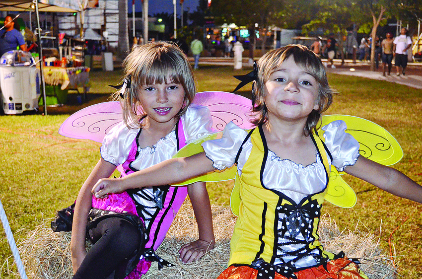 Brianna and Morgan Frederick dress as butterflies Oct. 27 at the Sarasota Pumpkin Festival at Payne Park.