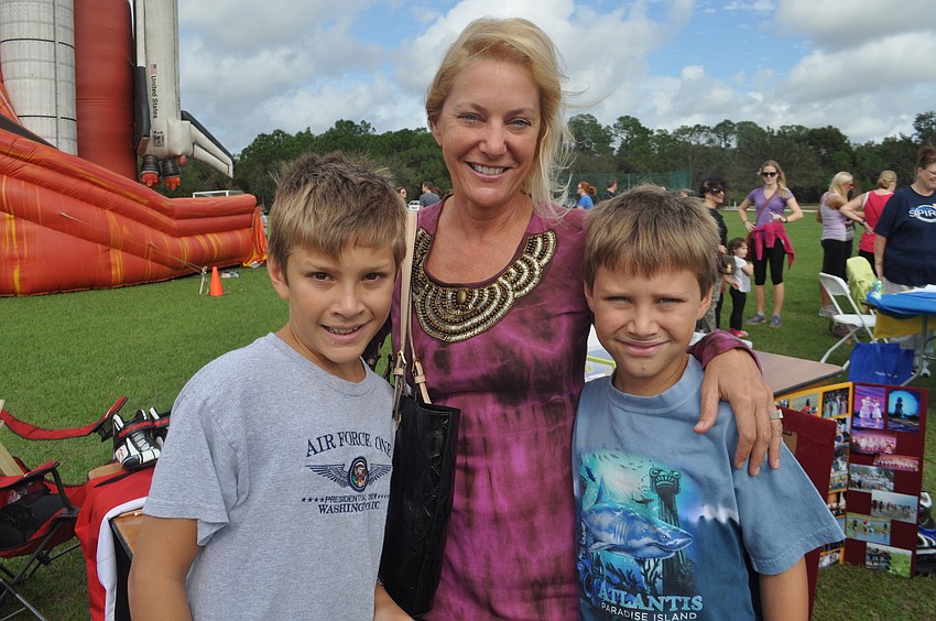en-year-old Alex Talbot attends with his mom, Carolyn, and brother Matthew, 9.