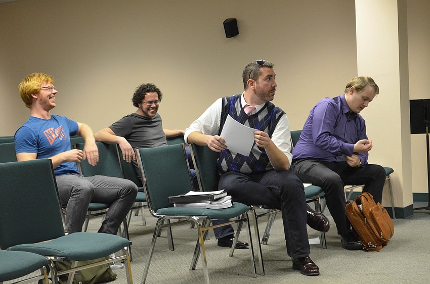 Bartione Kenneth Stavert, tenor Jon Jurgens, bass-baritone William Roberts, and tenor George Somerville in rehearsal