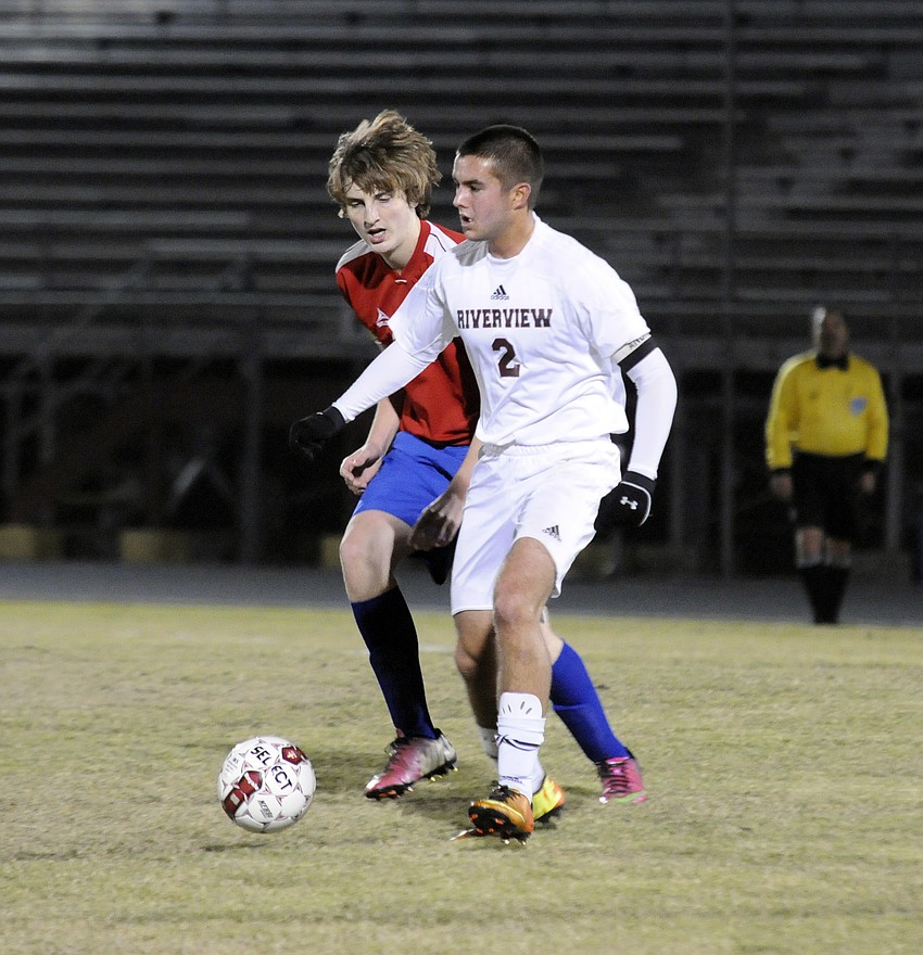 Riverview midfielder JT Truitt dribbles past a Pinellas Park defender in the first half.
