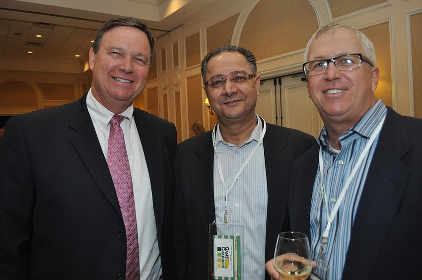 Patrick Gregorius and Dr. Adnan Sammour, Saint Stephenâ€™s supporters, with Bob Smith, a board member for the school