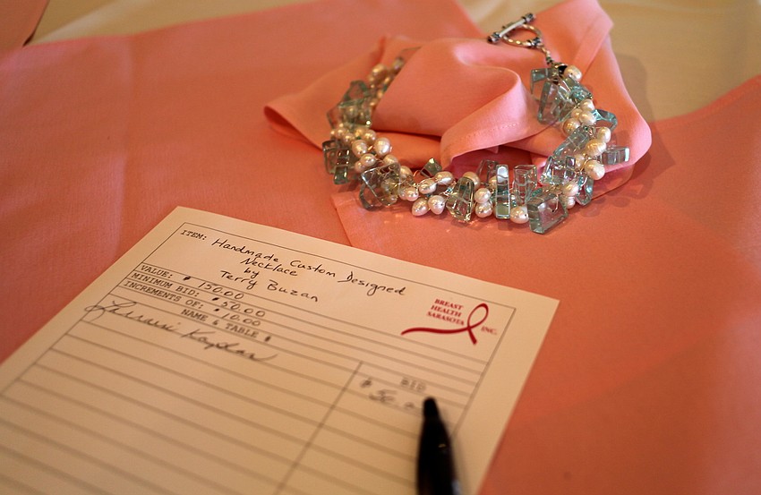 The event also featured a silent auction full of unique items, like this handmade necklace by Terry Buzan.
