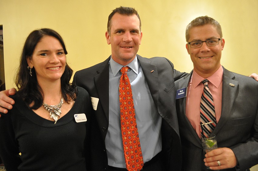 Rhonda Coblentz of Principal Financial Services, Jamie Purmort of Purmort & Martin Insurance Agency and Nick Dzembo of Cadence Bank