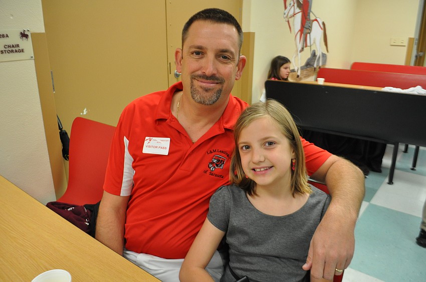 Anthony and McKinley Evans enjoy breakfast together.