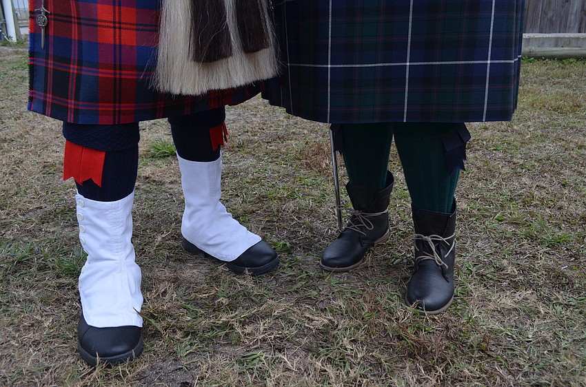 Carleton Cook wears spaats while wife, Anyah, wears kilt hose and flashes.