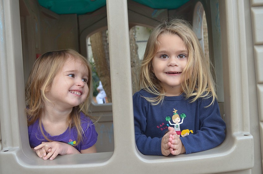 Lily Shelson and Ashlyn Thiron take a break from riding.