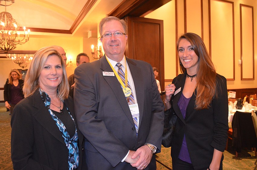 Jan Brown, Troy Peterman and Jaquelyne Assell from PayServ.