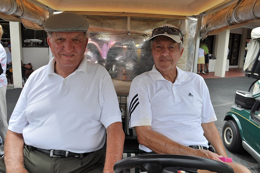 Bill Heerman and Tom Murray find a shady spot to rest.