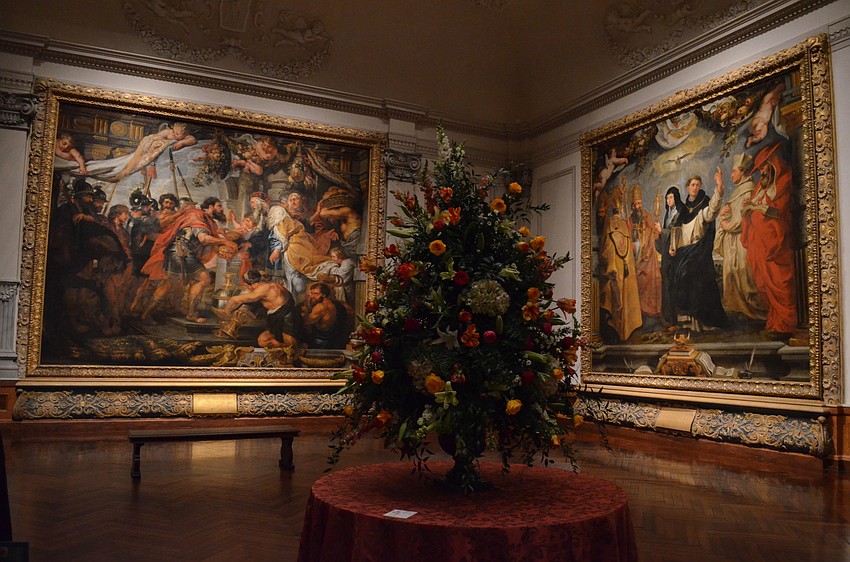 Julie Eisele and Joanne Northrup were inspired by The Triumpho of the Eucharist Series in Gallery 2. This design was the biggest filling a 5 foot round table.